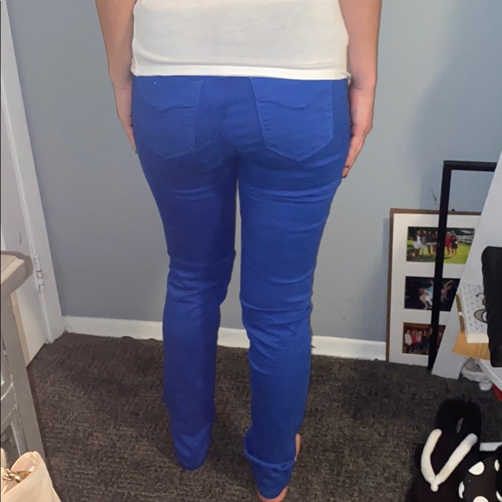 Never worn bright blue jeans